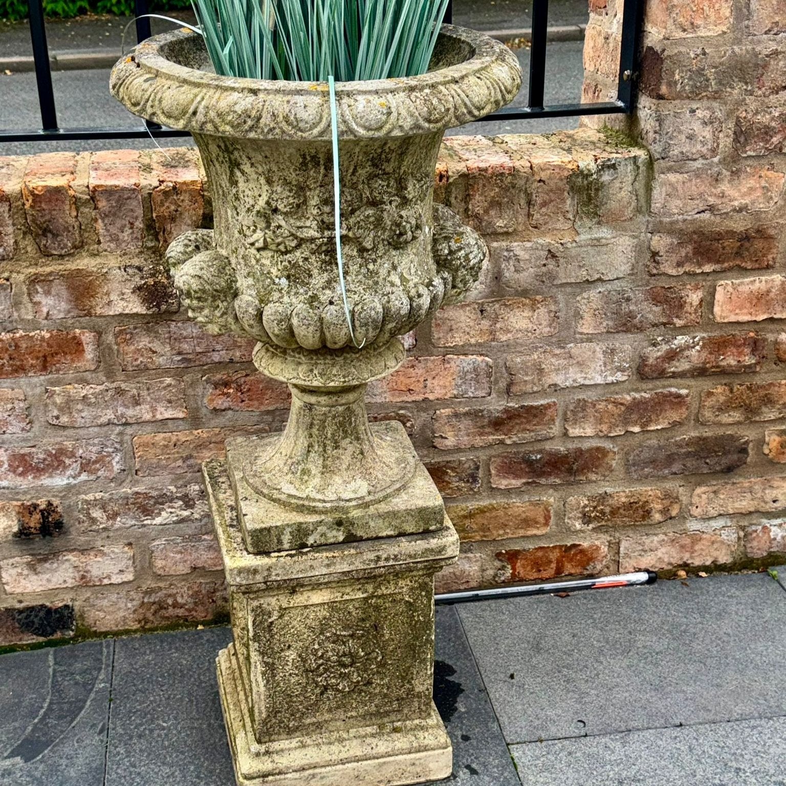 Aged Stone Urn on Plinth