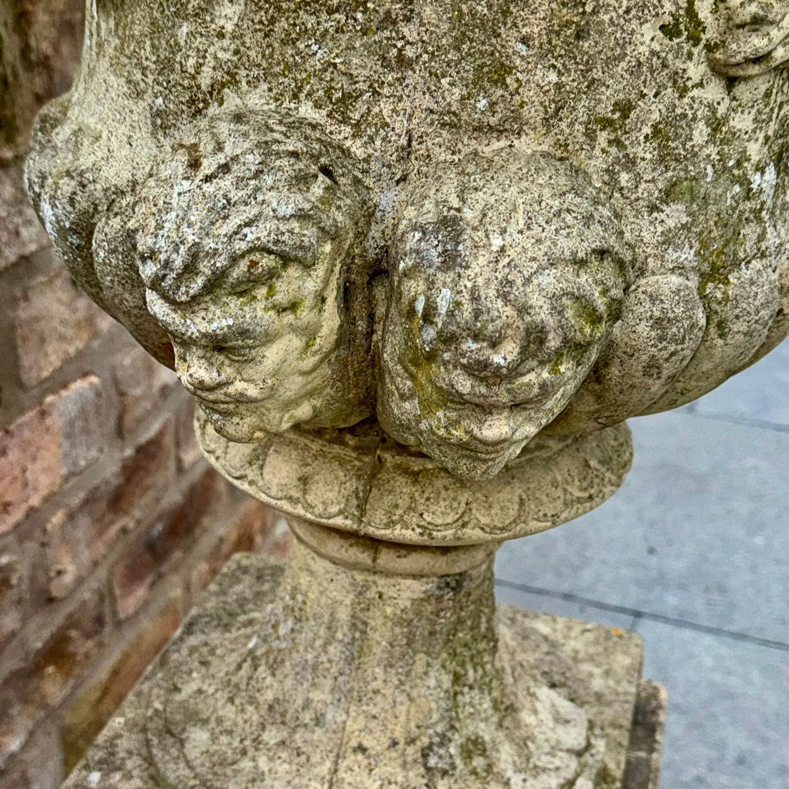 Aged Stone Urn on Plinth